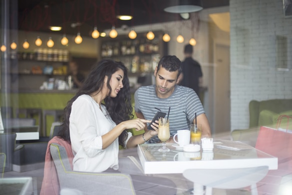 Young couple in the cafe - Can Aries Men Be Secretive