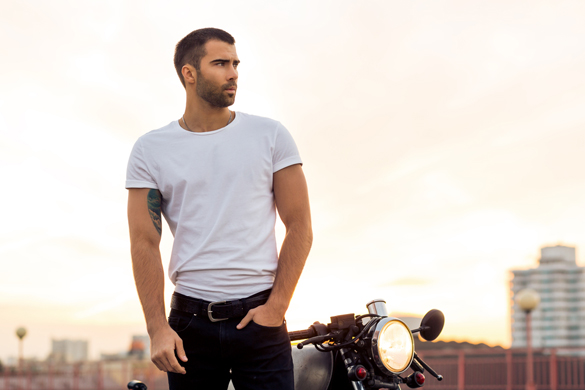 Sporty biker handsome rider male in white blank t-shirt - Will an Aries Man miss you when you’re not around